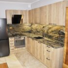 Fusion Gold PS Granit Gdynia blaty kuchenne i ściana